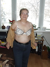 Granny takes off all of her clothes and starts playing