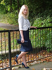 Blonde Milf Iona is teasing outdoors in a lovely pair of blue high heels